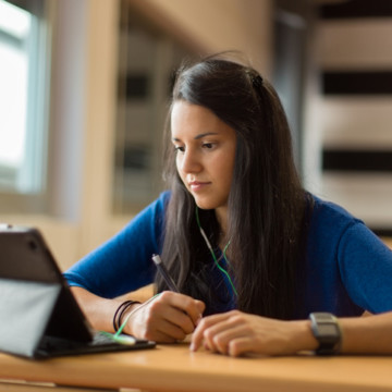 Young women studying at university classroom