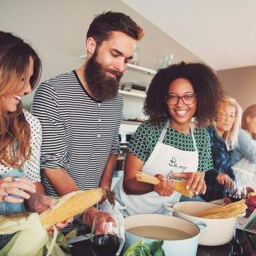 Happy,Group,Of,Young,Adult,Men,And,Women,Cooking,Together