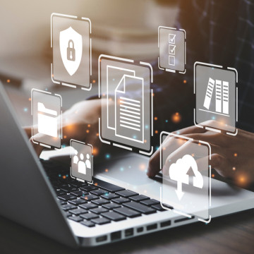 Businessman,Using,A,Computer,To,Document,Management,Concept,,Online,Documentation
